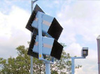 Double monitor stack and folding camera post
                                                  assembly
